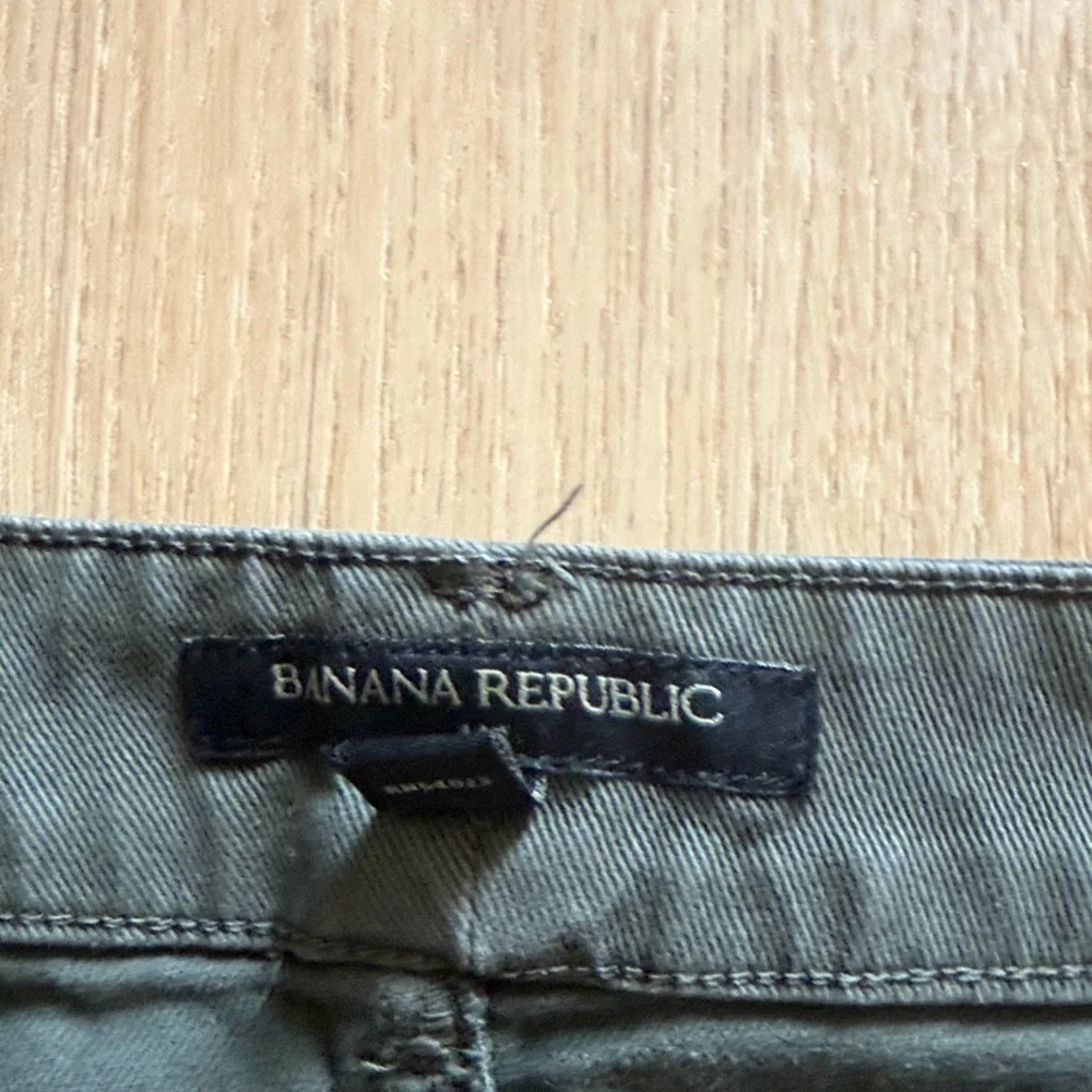 Banana Republic olive button-front mini skirt